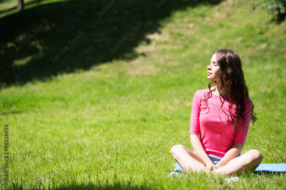 Woman relaxing outdoors.