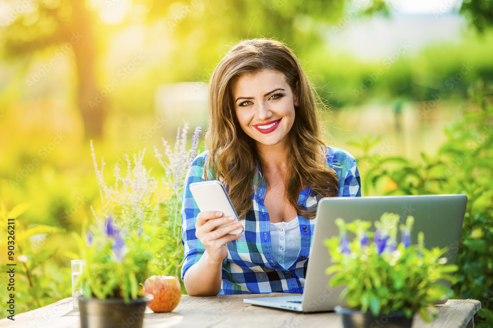 Beautiful young woman gardening Beautiful young woman gardening