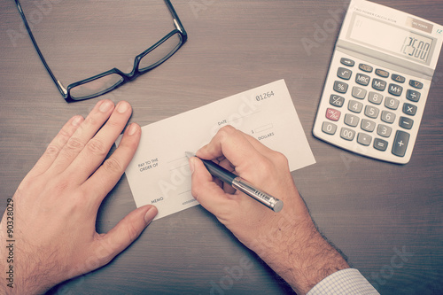 Man writing a check