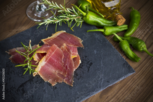 serrano ham with rosemary and peppers