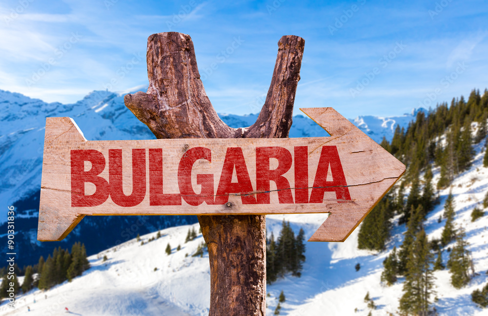 Bulgaria wooden sign with winter background