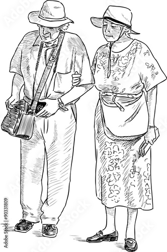elderly spouses on a stroll