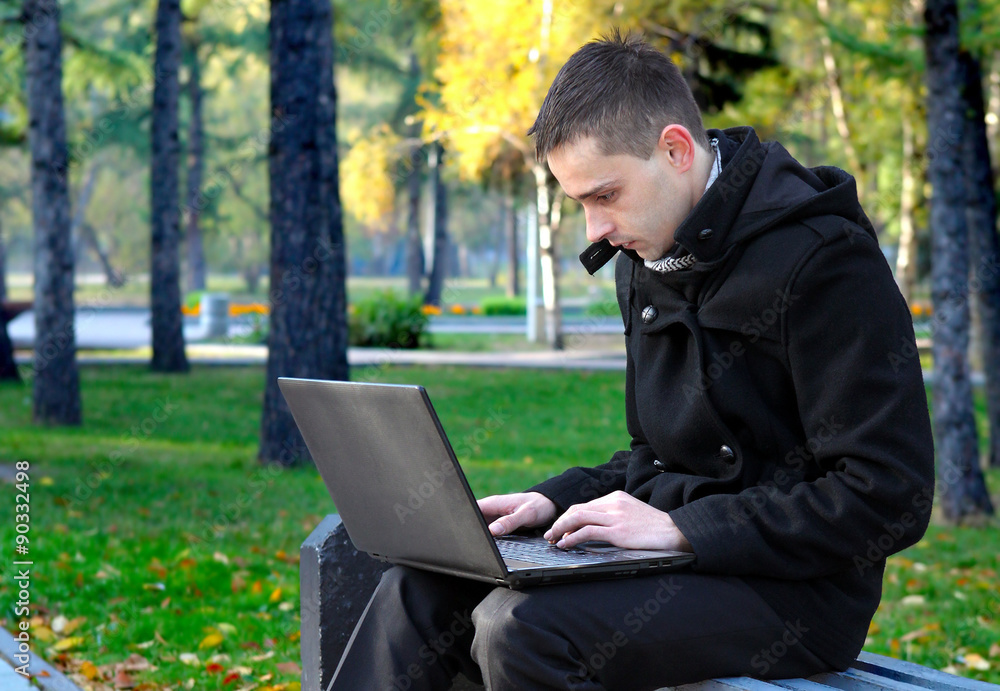 Young Man with Laptop