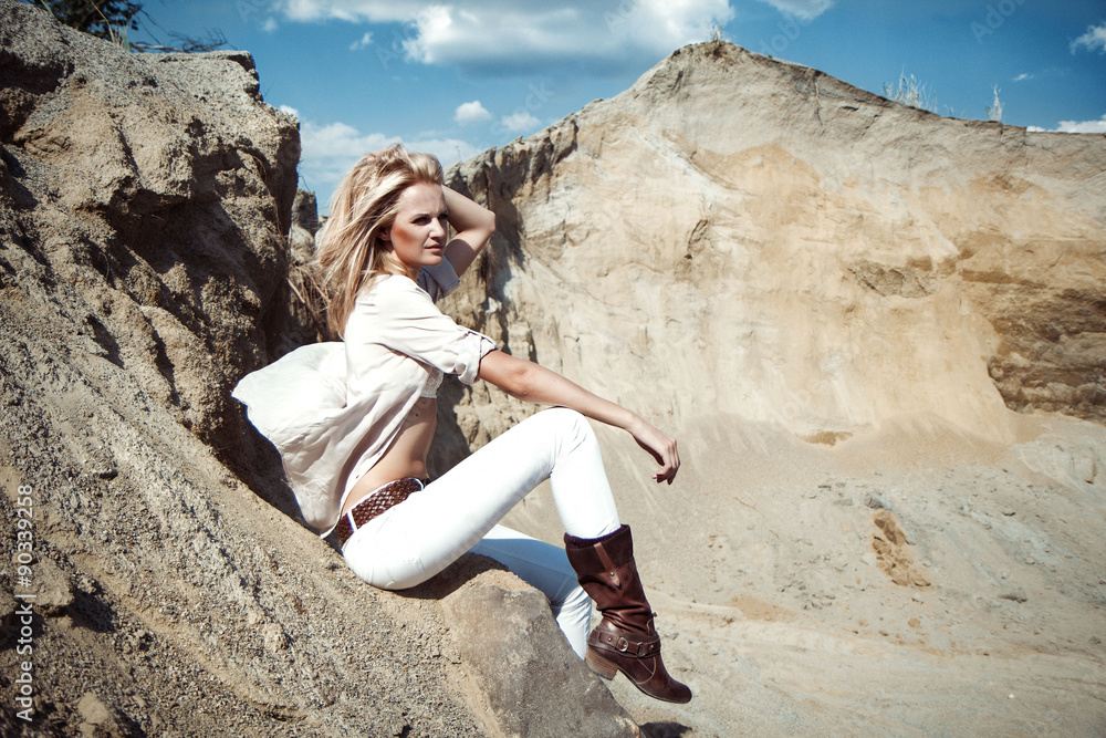Fototapeta premium Fashion portrait of stilish young lady in white pants , shirt an