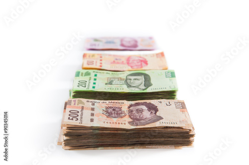 Mexican money isolated on white /selective focus photo