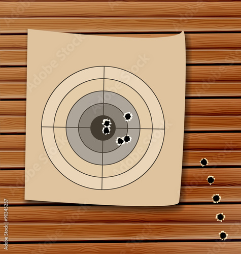 Shooting range target with bullet holes