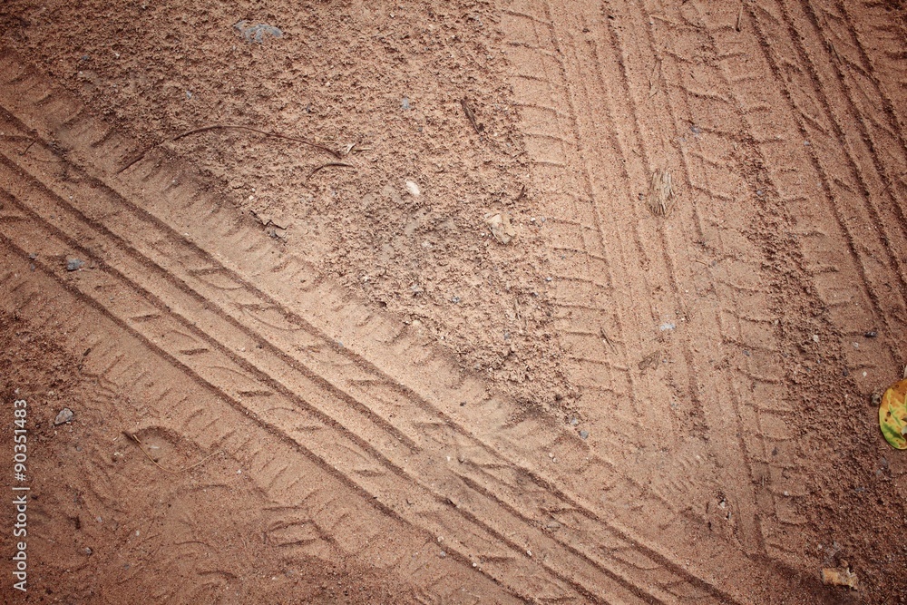 Fototapeta premium Wheel tracks on the soil.