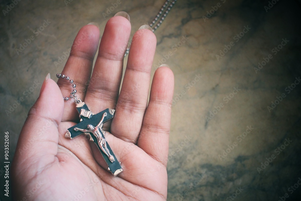 Hands praying with cross Hands praying with cross