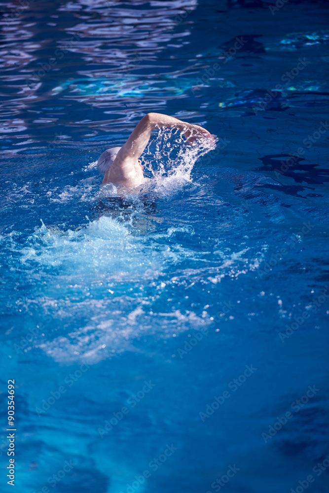 swimmer excercise on indoor swimming poo