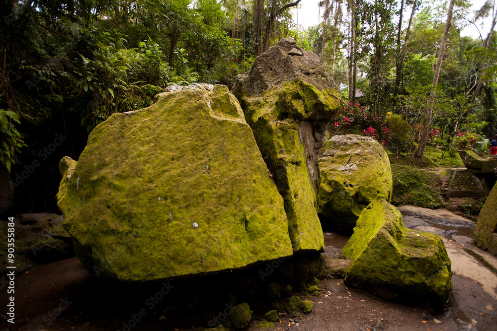 Landscape with huge mossy boulders on Pura Goa Gajah.goa gajah t Landscape with huge mossy boulders on Pura Goa Gajah.goa gajah t