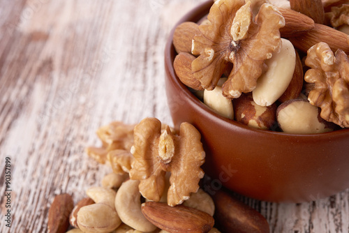 Mix nuts on wooden background