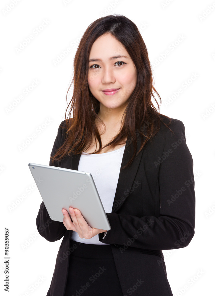 Asian businesswoman use of the digital tablet Asian businesswoman use of the digital tablet