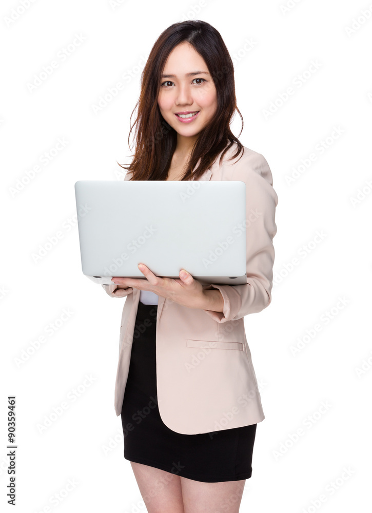 Asian businesswoman use of the laptop computer Asian businesswoman use of the laptop computer