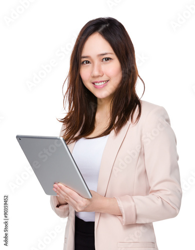 Young businesswoman use of the digital tablet