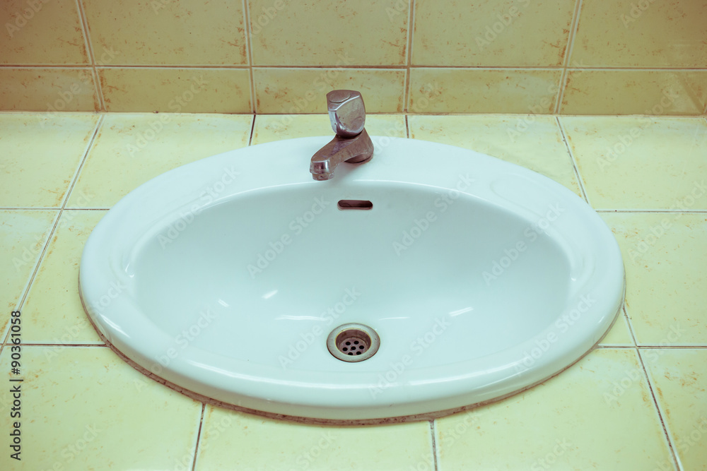 white wash sink in the bathroom with old silver faucet white wash sink in the bathroom with old silver faucet