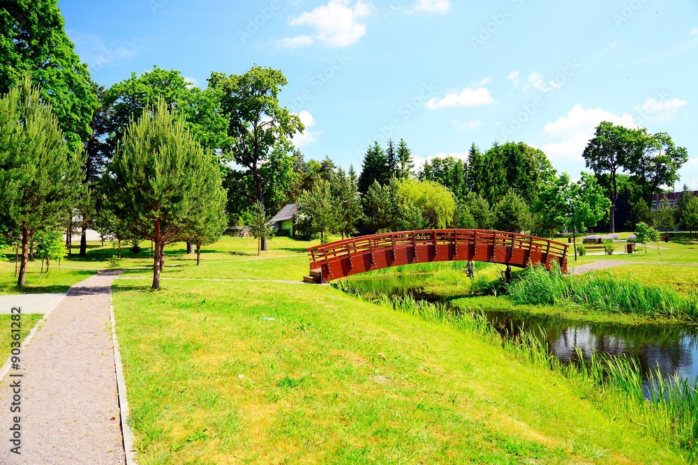Fototapeta premium Bridge over pond in Viesintos village Anyksciai district