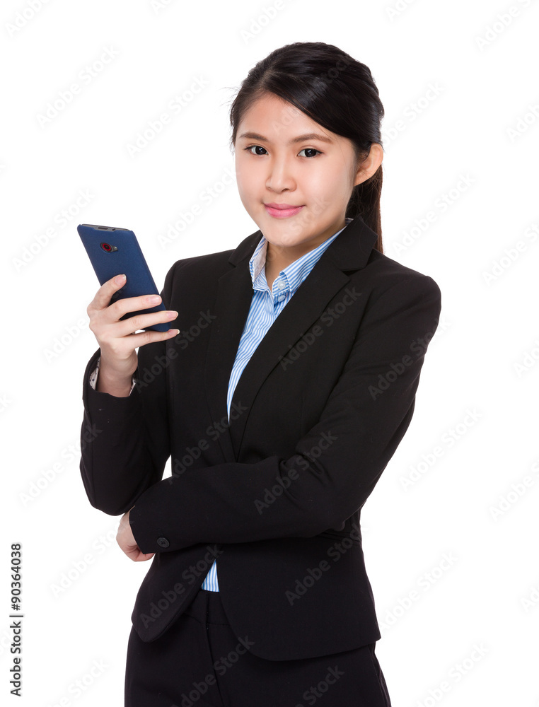 Businesswoman use of the cellphone Businesswoman use of the cellphone