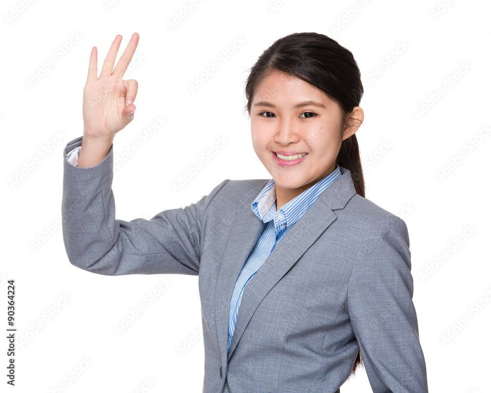 Businesswoman with ok sign gesture Businesswoman with ok sign gesture