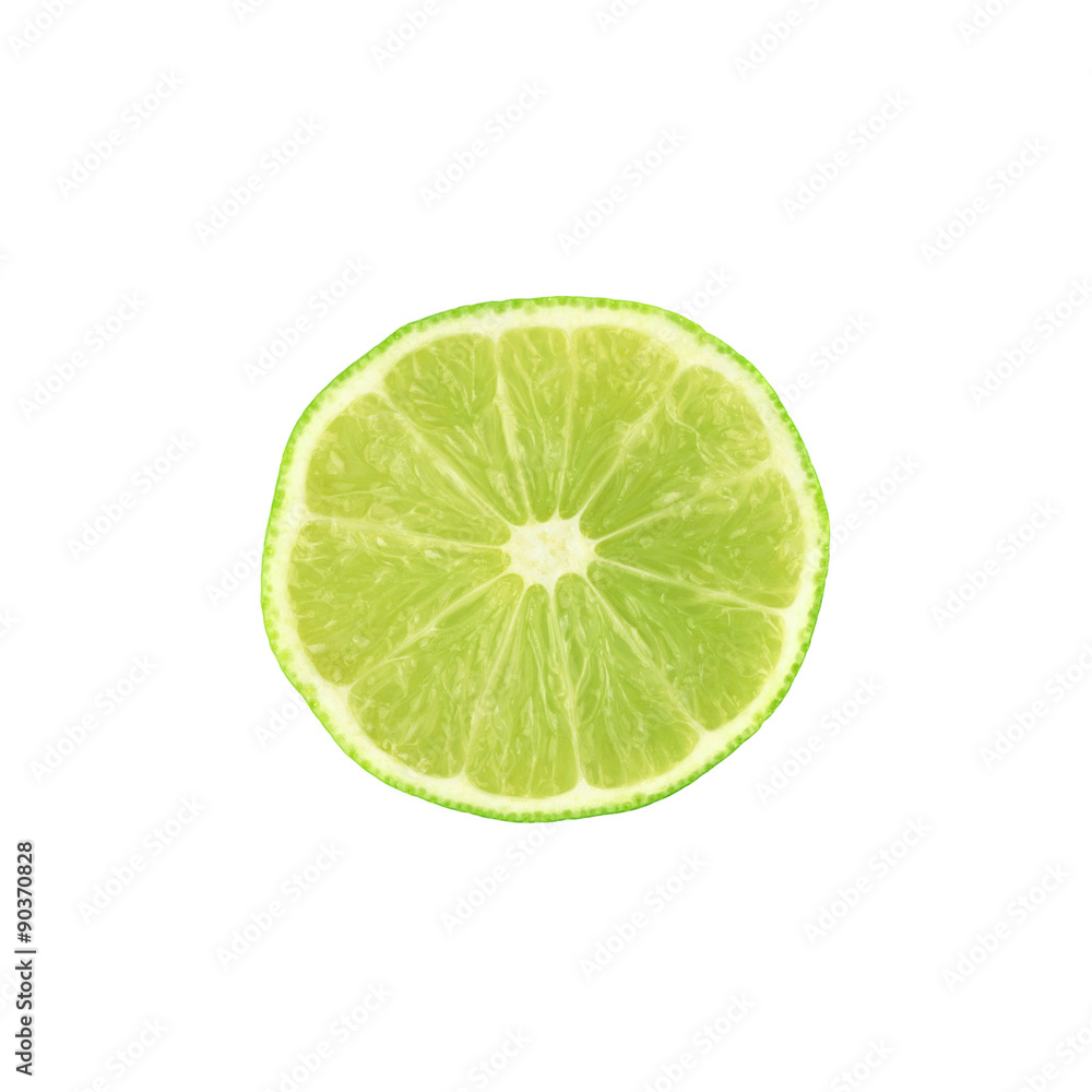 Ripe lime cut in half isolated over the white background Ripe lime cut in half isolated over the white background