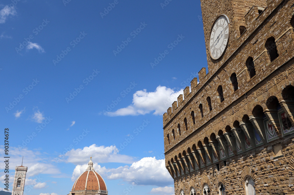 Florence Italy Historic clock tower building and dome Cathedral