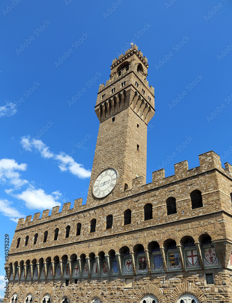Florence Italy Historic clock tower building and blue sky