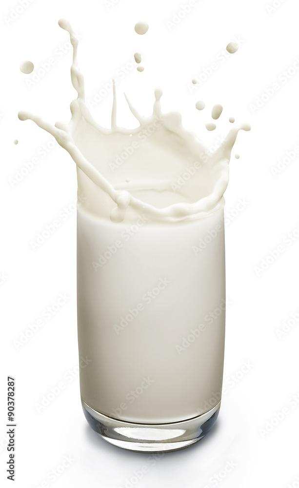 Splash of milk in the glass. Closeup. Splash of milk in the glass. Closeup.