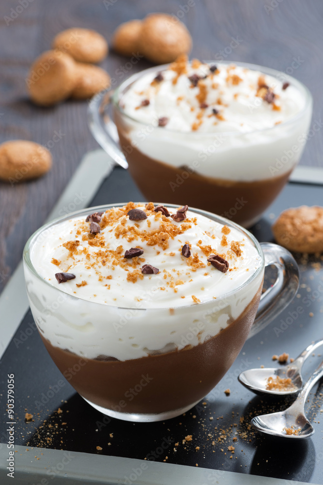 dessert with chocolate, cream and amaretti in cups, vertical dessert with chocolate, cream and amaretti in cups, vertical