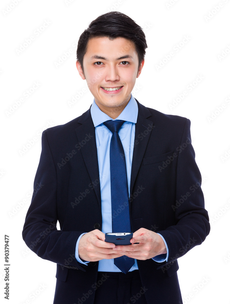 Young businessman use of the cellphone Young businessman use of the cellphone