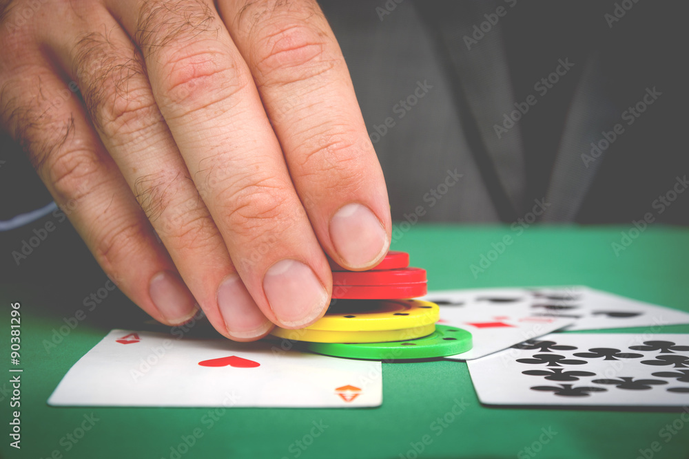 Man playing poker Man playing poker