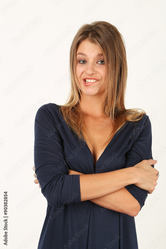 portrait of surprised young woman in blue dress portrait of surprised young woman in blue dress