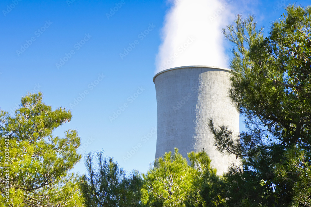 Geothermal power plant in Tuscany hills with copy space Geothermal power plant in Tuscany hills with copy space