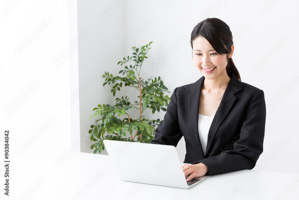 asian businesswoman using laptop asian businesswoman using laptop