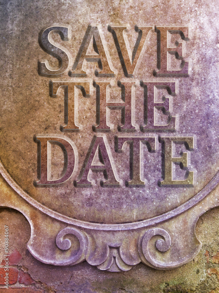 Save the date carved on a stucco wall Save the date carved on a stucco wall