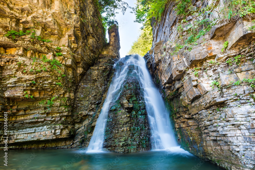 Fototapeta premium Beautiful waterfall in the forest