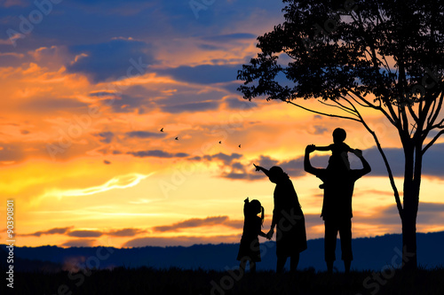  silhouette of a happy family of five people, mother, father, baby, child and infant(women prenancy)