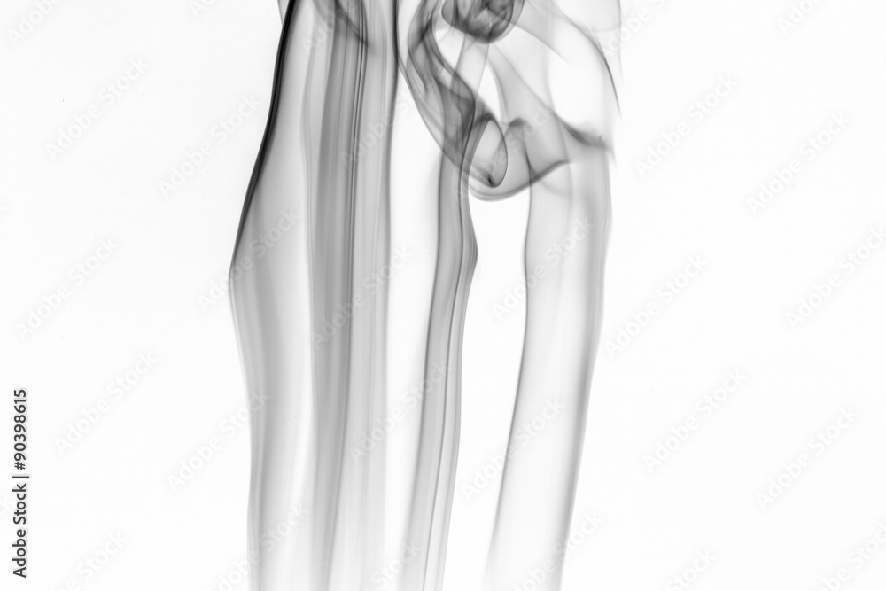 Abstract black smoke swirls over white background Abstract black smoke swirls over white background
