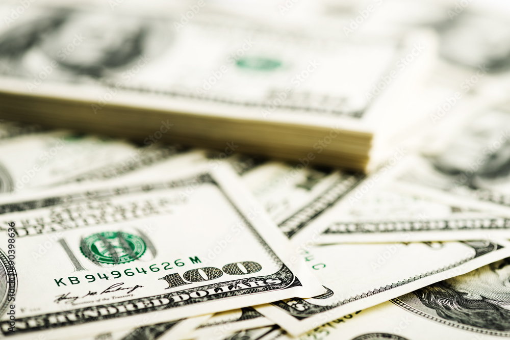 Stack of one hundred dollar bills close-up. Stack of one hundred dollar bills close-up.