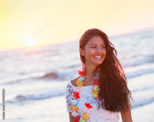 Εκτύπωση καμβά Beautiful young teenager with a white dress on the beach at suns