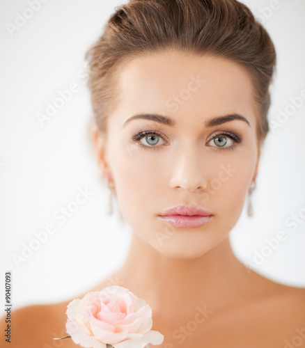 young woman with rose flower