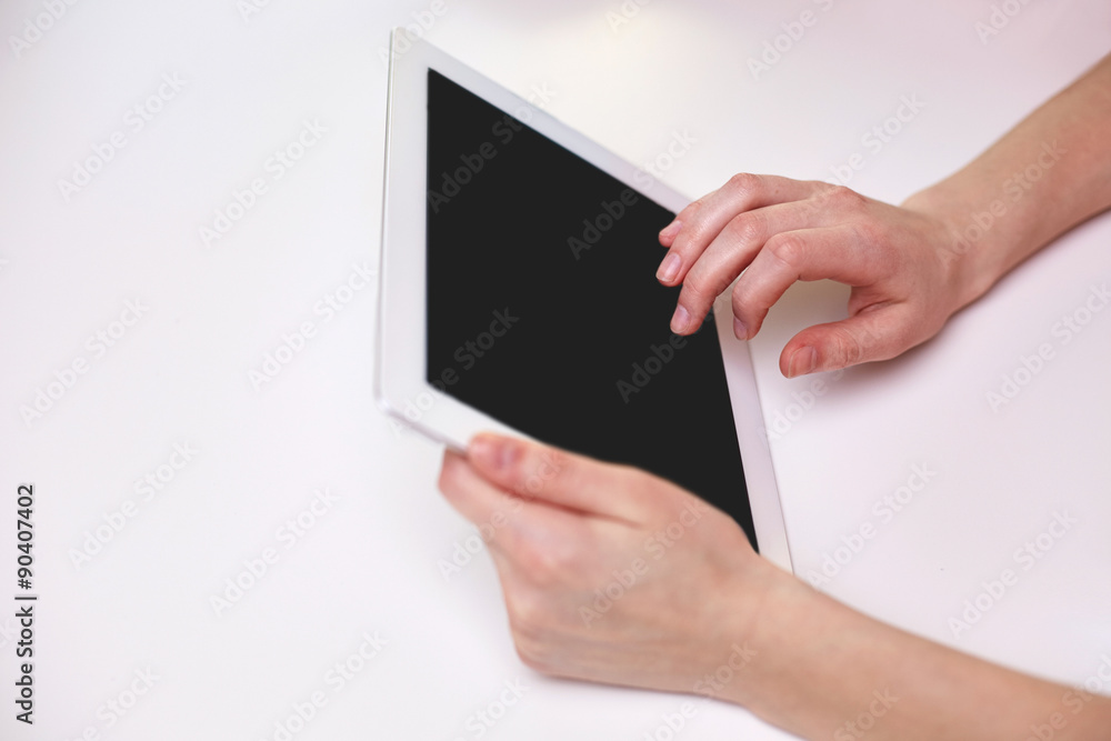 close up of female hands with tablet pc at table close up of female hands with tablet pc at table