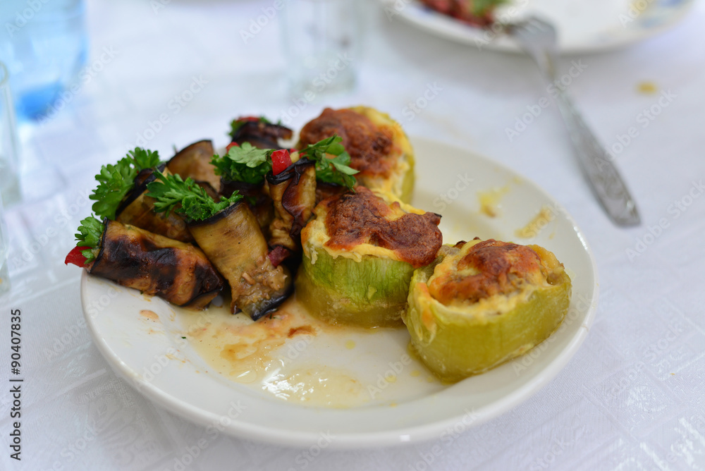 eggplant, zucchini stuffed with meat, rice, and mushrooms, grated cheese eggplant, zucchini stuffed with meat, rice, and mushrooms, grated cheese