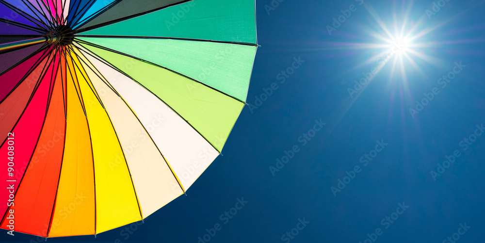 Obraz premium colorful umbrella segments on blue sky