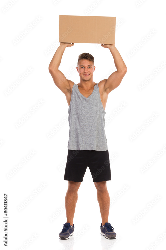 Man Holding Package Above His Head