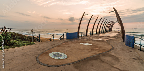 View of ships on Indian Ocean through the Millenium Pier in Umhlanga Rocks at sunrise