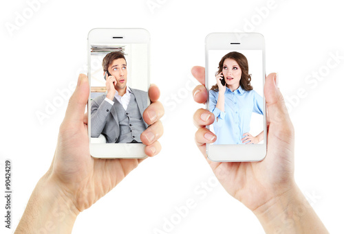 Couple on screens of phones...