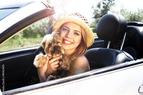 Happy girl with cut dog in ...