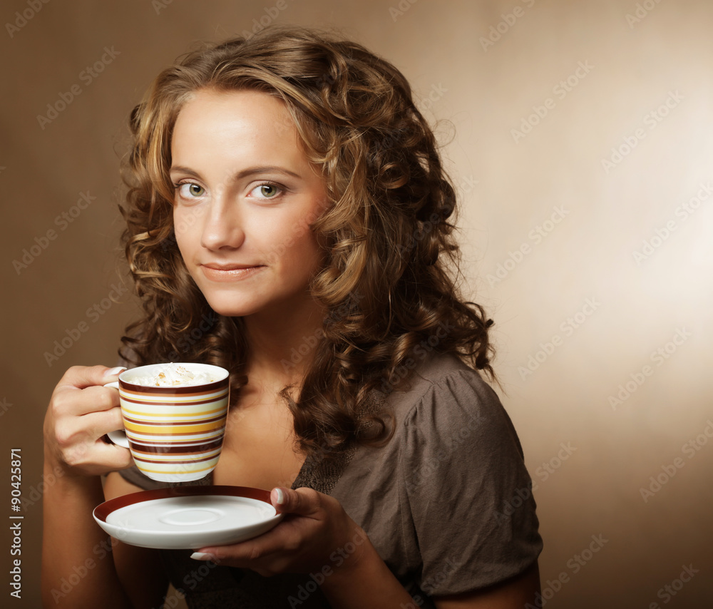 young girl drinking tea or coffee young girl drinking tea or coffee