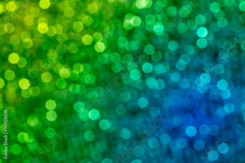 Abstract circular bokeh background, green and blue mix