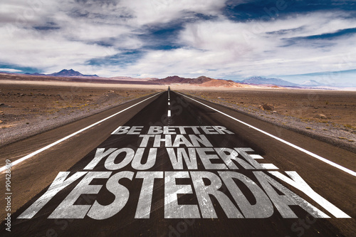 Be Better Than You Were Yesterday written on desert road