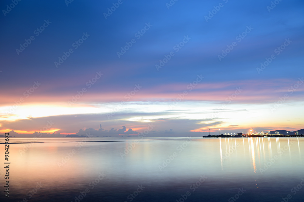 Panoramic dramatic sunset sky and tropical sea at dusk.Long expo